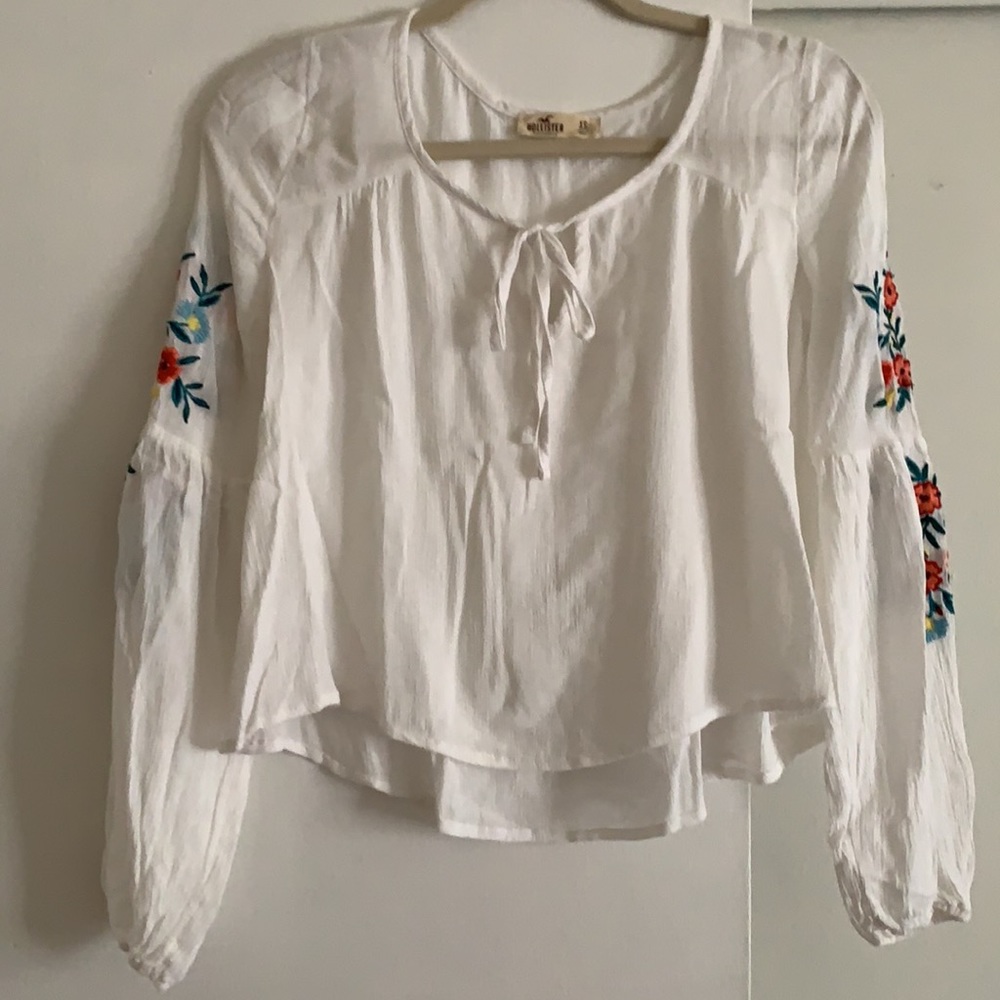 White Hollister XS colorful embroidered flowers